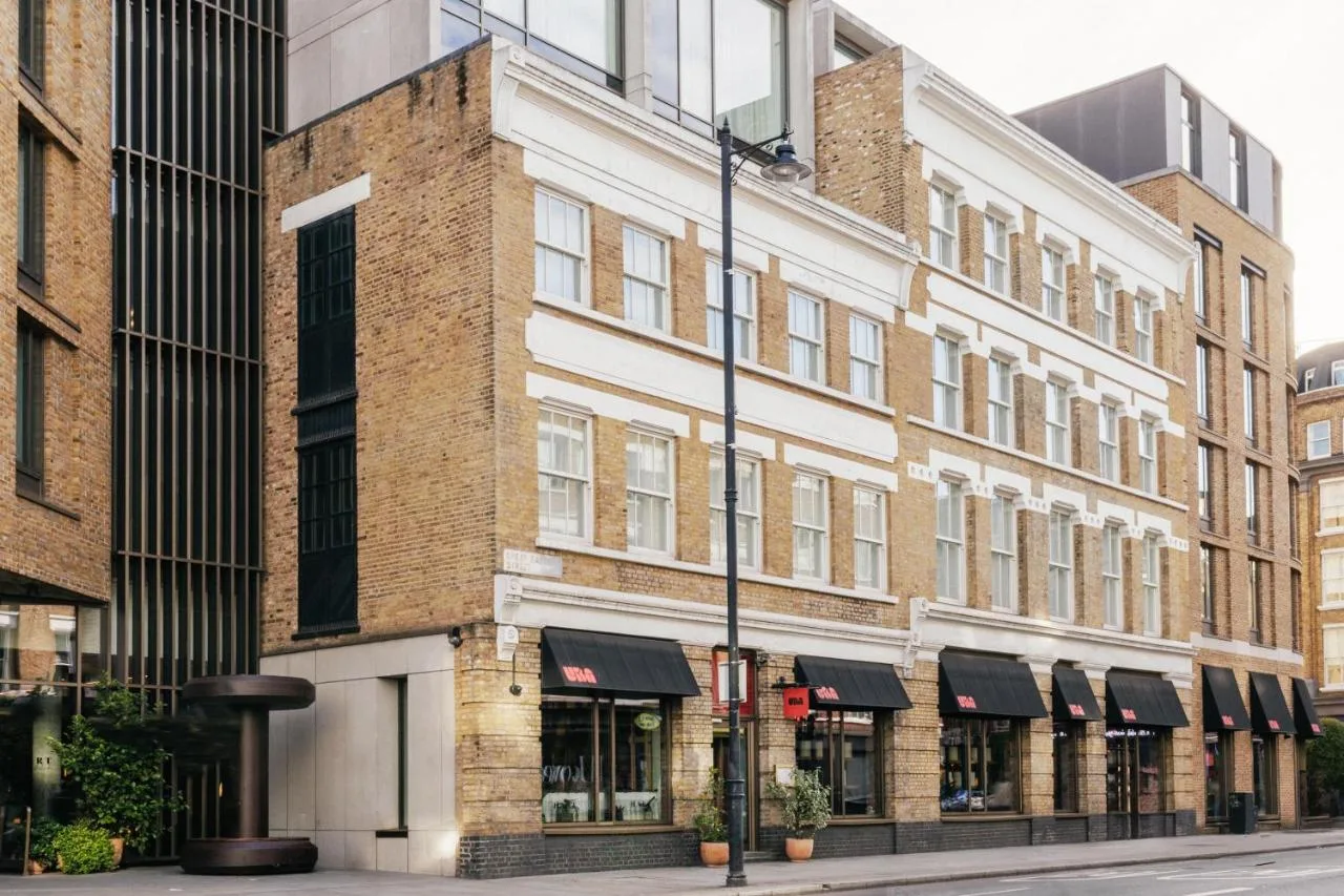 a row of buildings on a city street at Hart Shoreditch Hotel London, Curio Collection by Hilton in London